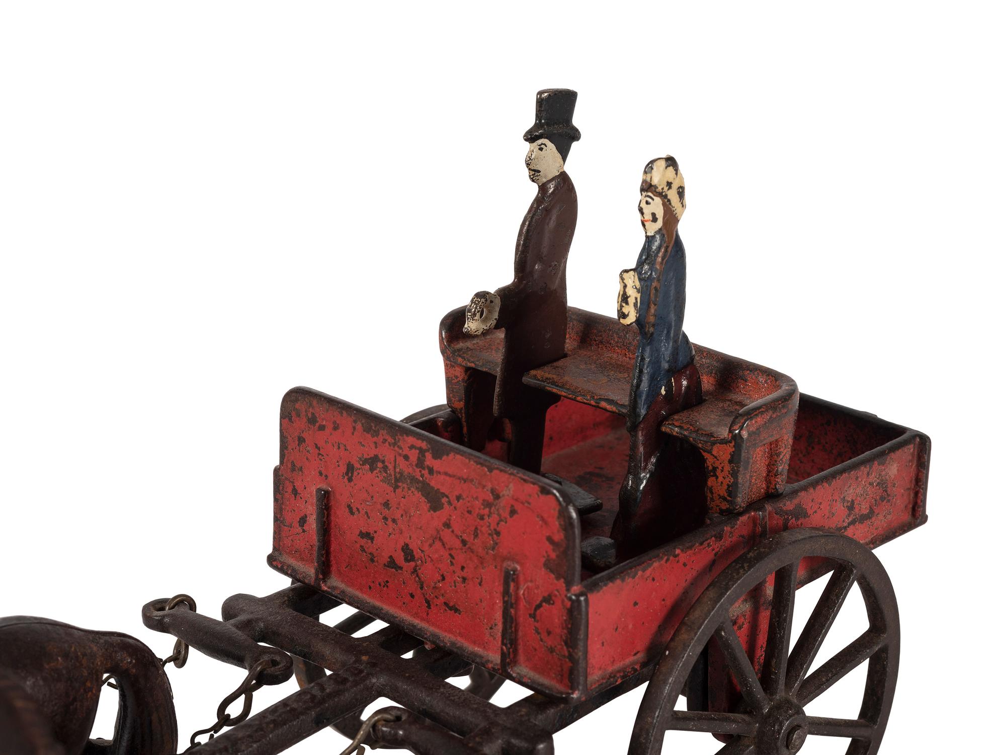 A Carpenter Cast Iron Horse Drawn Cart with Two Figures