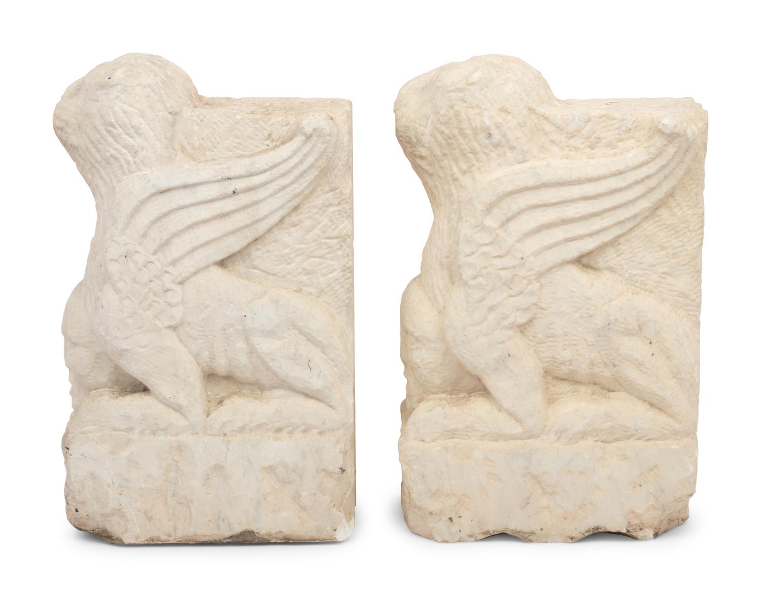 A Pair of Gothic Style Carved Marble Ornaments