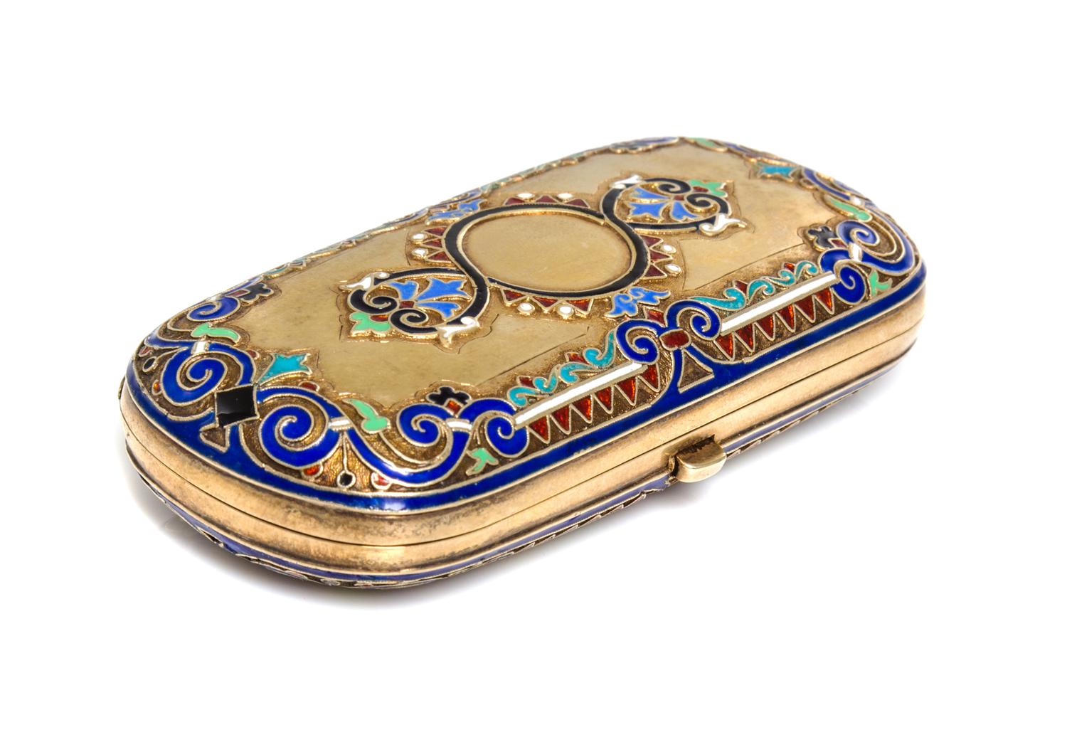A Russian Enameled Silver-Gilt Cigarette Case, Moscow, 19th/20th Century, of rectangular form centered with a polychrome medallion.