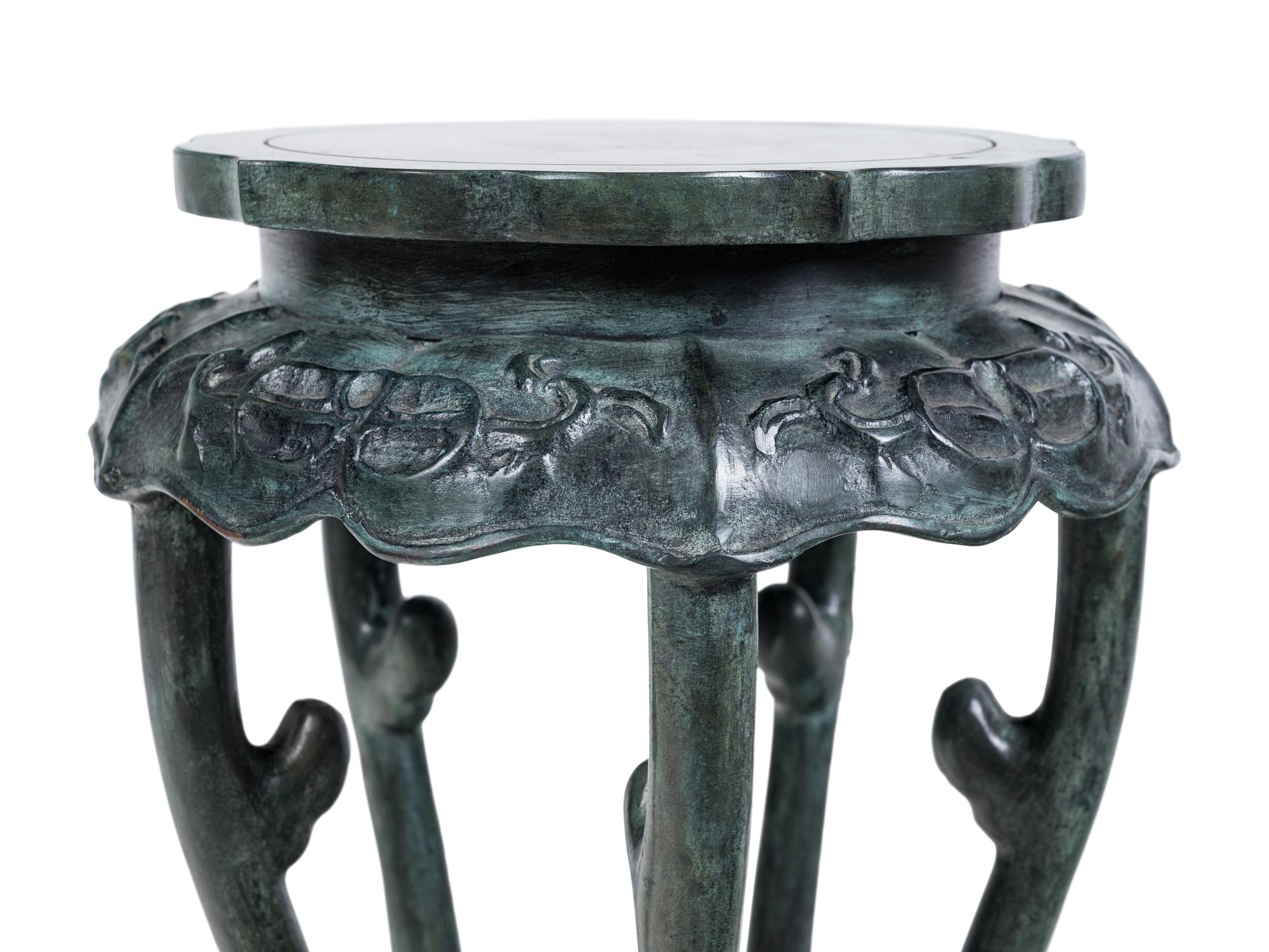A Chinese Patinated Bronze Pedestal Table