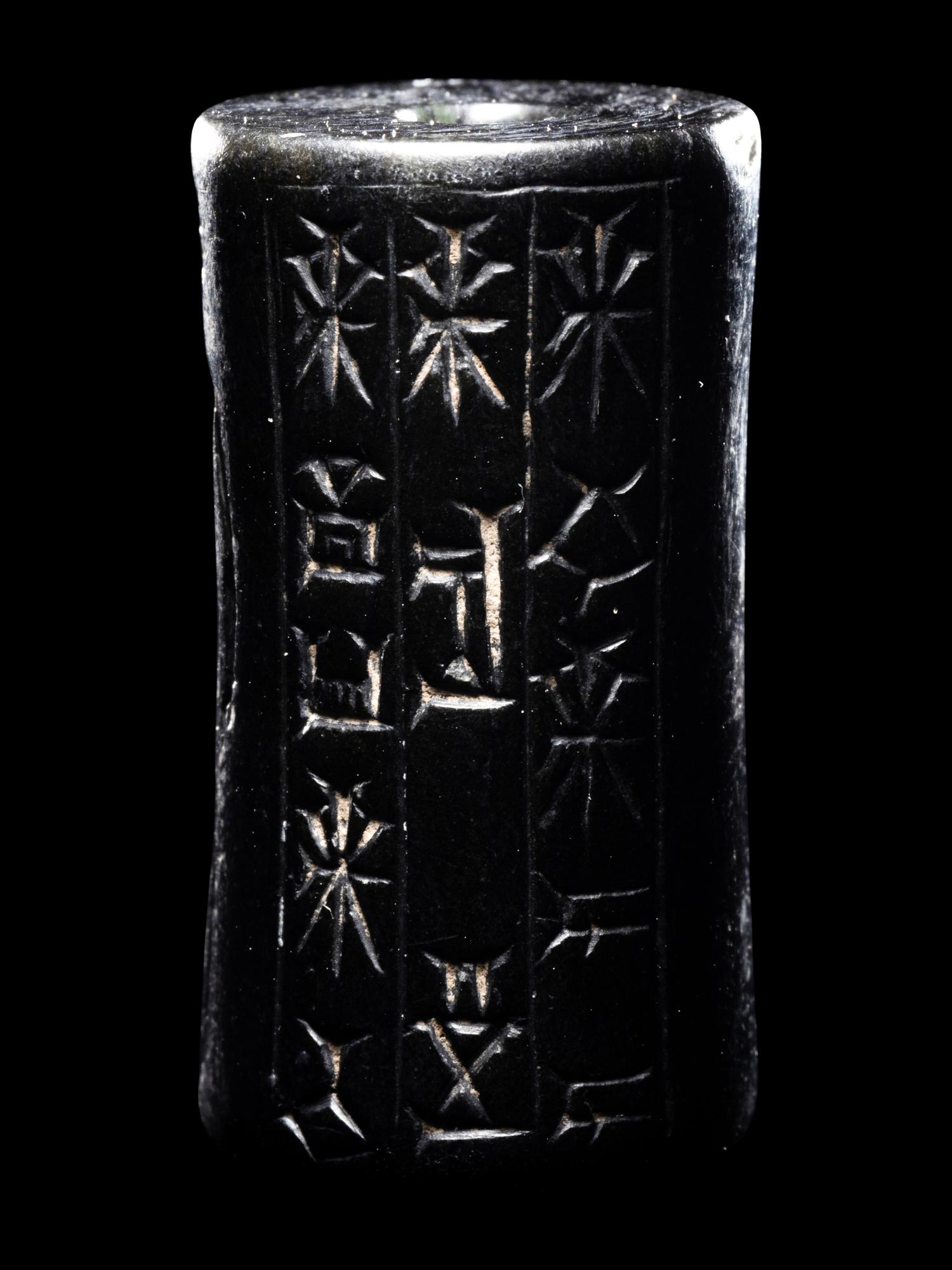 A Mesopotamian Hematite Cylinder Seal