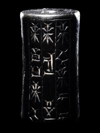 A Mesopotamian Hematite Cylinder Seal