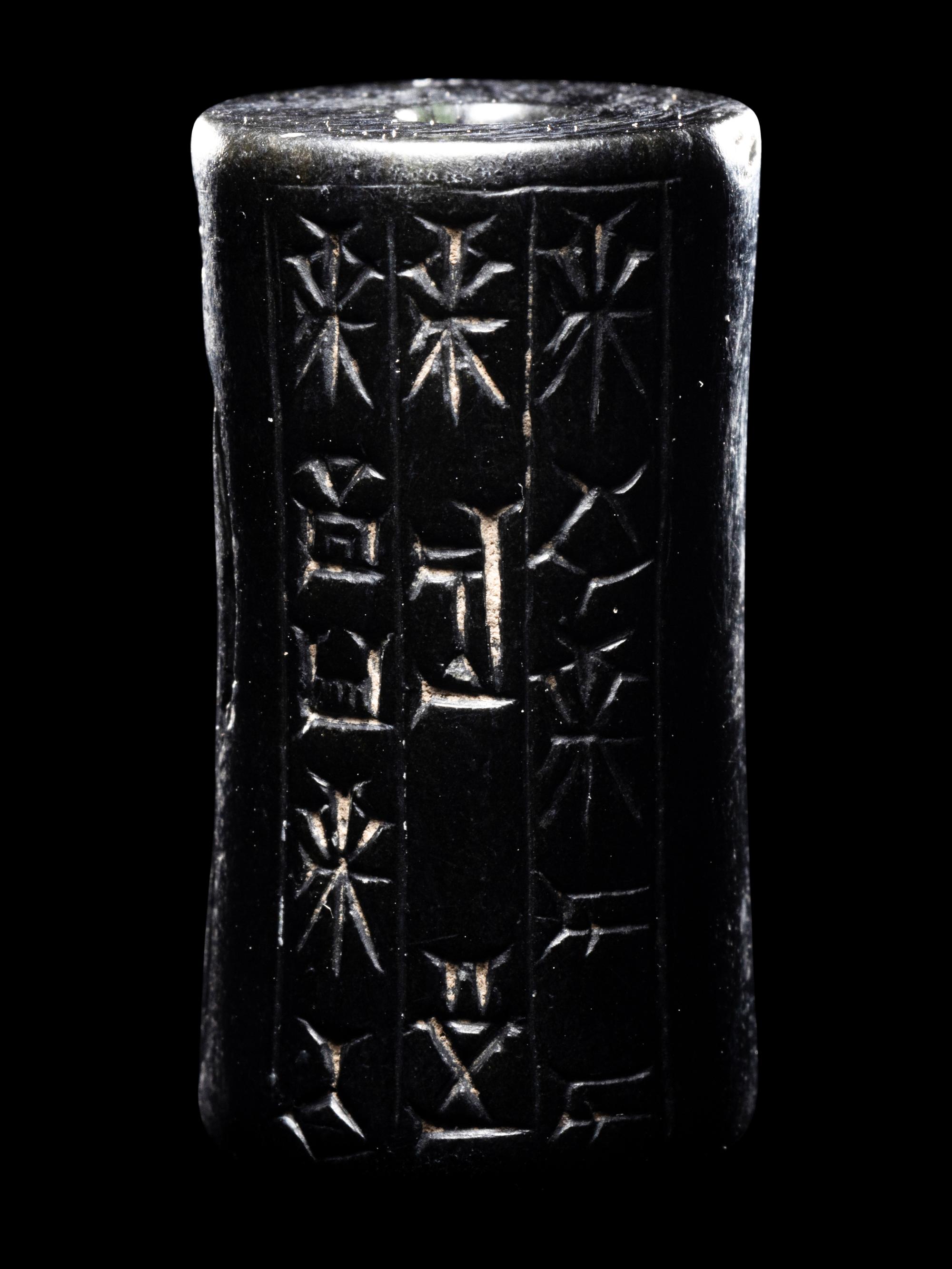 A Mesopotamian Hematite Cylinder Seal