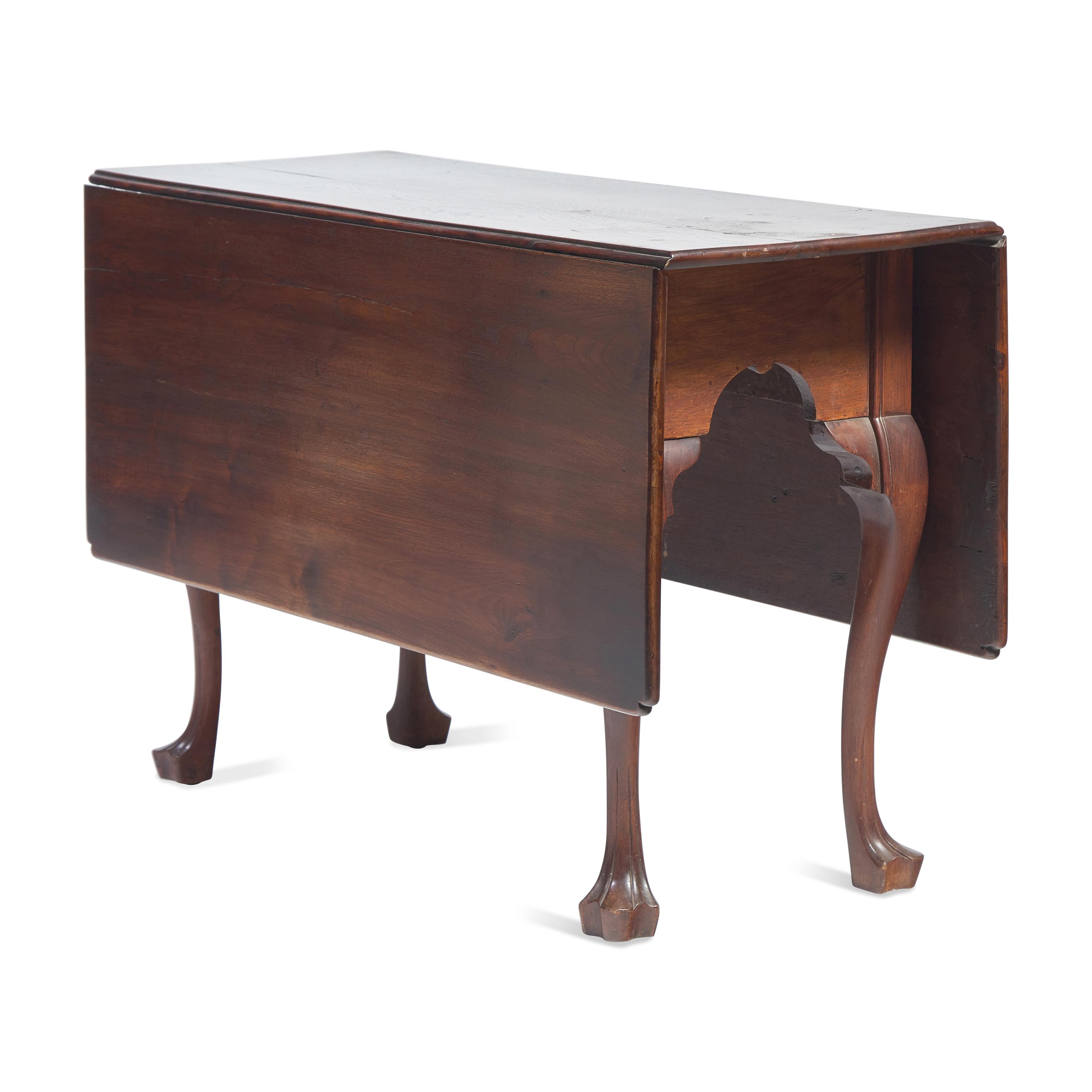 A Chippendale Carved Walnut Drop-Leaf Dining Table