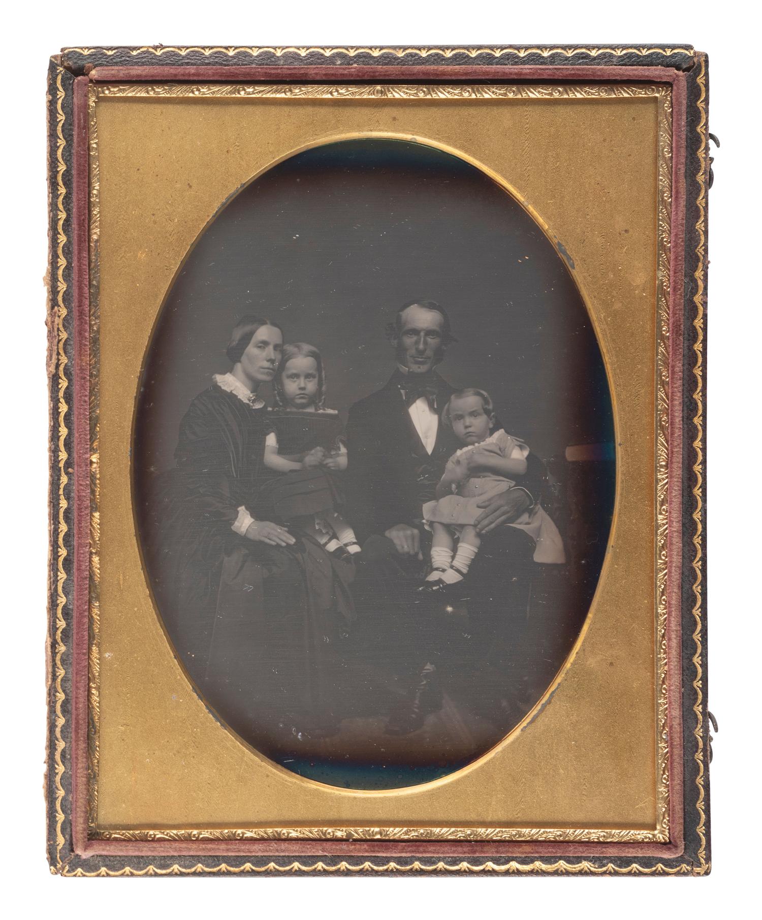 [EARLY PHOTOGRAPHY]. Two daguerreotypes of families, incl. oversized portrait by McClees and Germon, Philadelphia.
