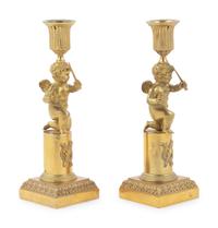 A Pair of Louis XVI Gilt Bronze Figural Candlesticks