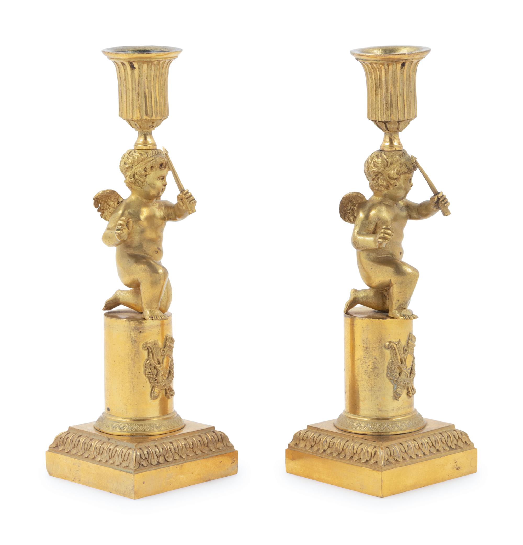 A Pair of Louis XVI Gilt Bronze Figural Candlesticks