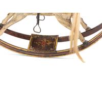 A Carved and Painted Wood Rocking Horse