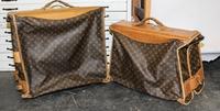 Two Louis Vuitton Monogram Canvas Garment Bags. Height of first 43 inches.