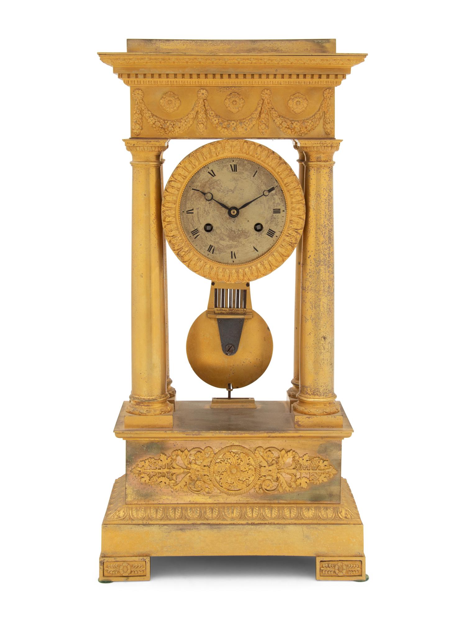 A Charles X Gilt Bronze Mantel Clock