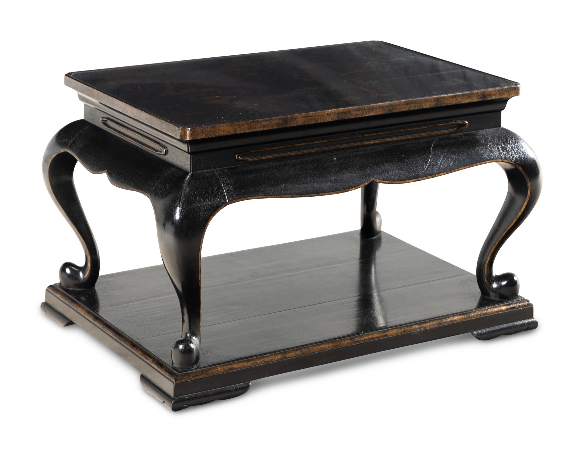 A Contemporary Ebonized and Parcel-Gilt Low Table