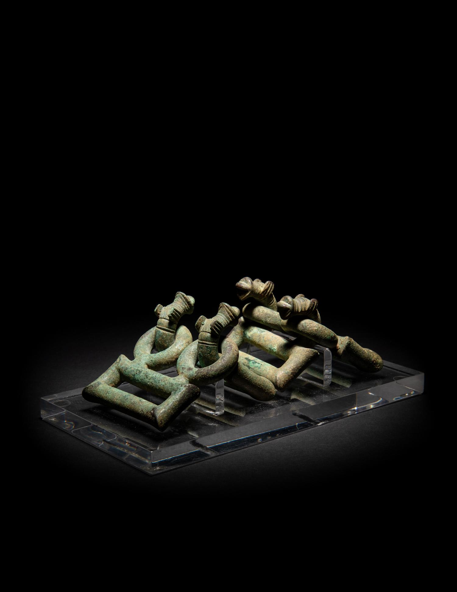 A Pair of Villanovan Bronze Horse Head Buckles