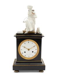 An Empire Gilt Metal Mounted Figural Mantel Clock