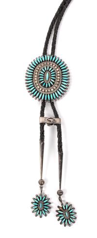 A Zuni Silver and Turquoise Petit Point Bolo Height 2 3/4 x width 2 3/8 inches.