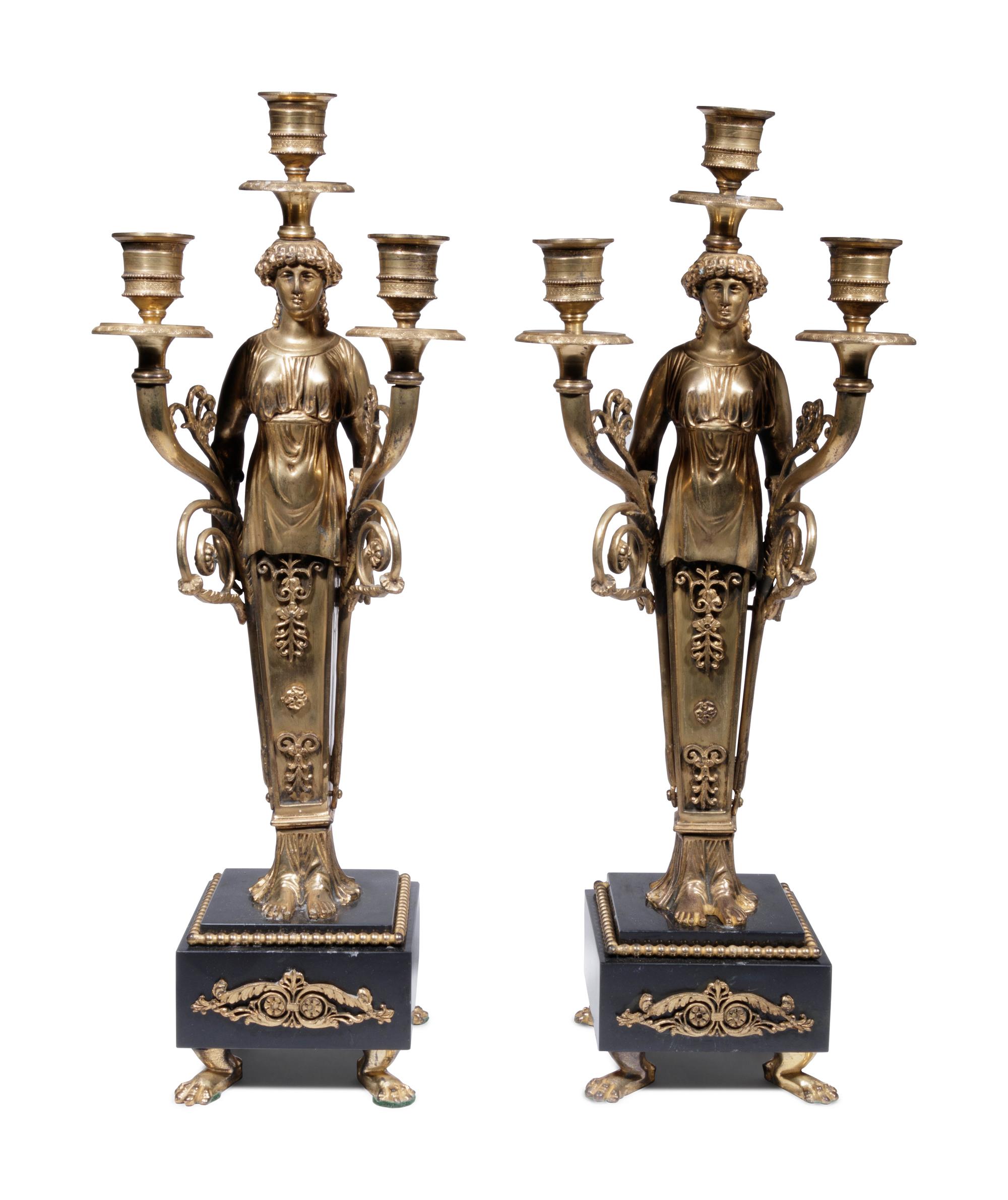 A Pair of Empire Style Gilt Bronze Figural Three-Light Candelabra