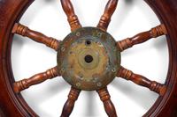 A Brass and Mahogany Ship's Wheel — EARLY 20TH CENTURY
