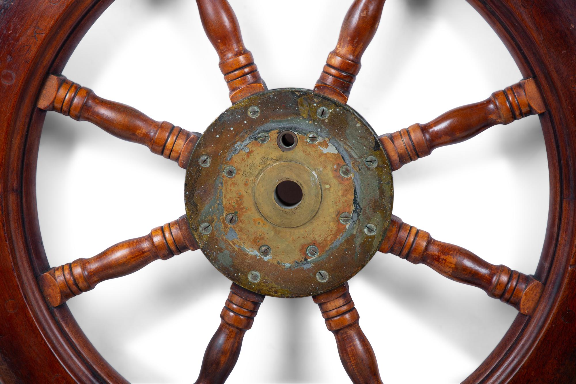 A Brass and Mahogany Ship's Wheel — EARLY 20TH CENTURY