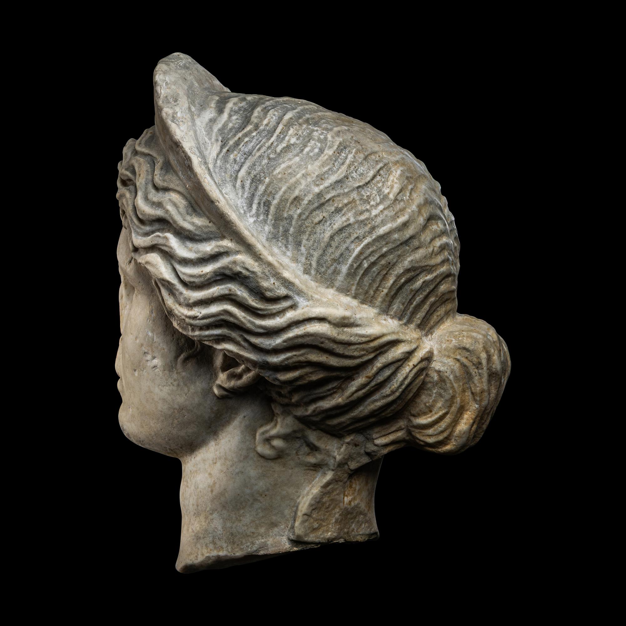 A Roman Marble Head of a Goddess