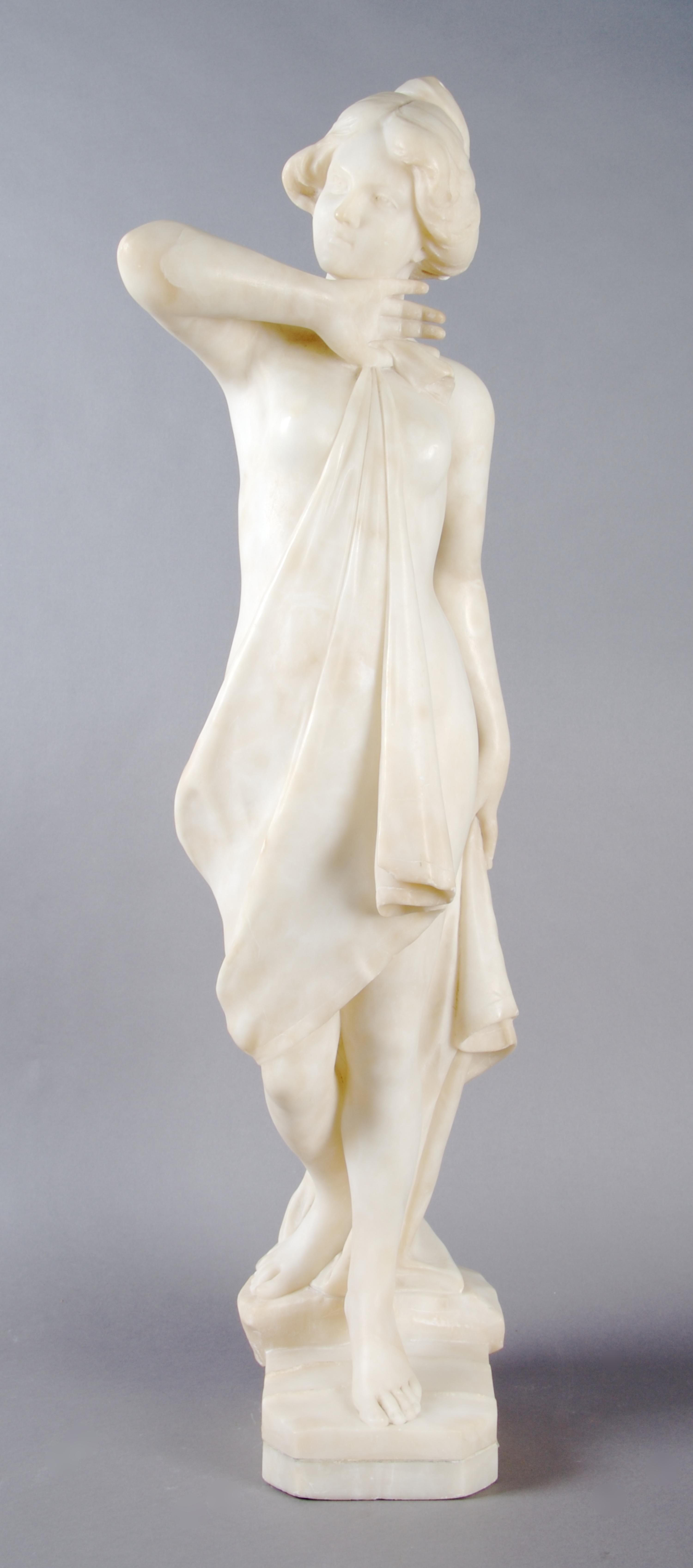 An Italian Marble Sculpture, E. Battiglia, Height 29 1/2 inches.