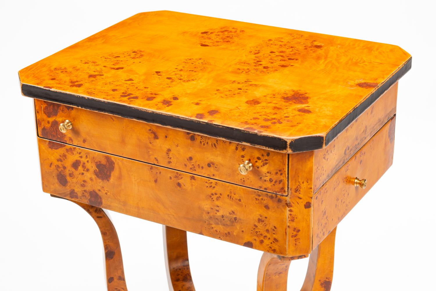 A Pair of Biedermeier Style Parcel Ebonized Burlwood Work Tables