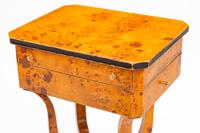 A Pair of Biedermeier Style Parcel Ebonized Burlwood Work Tables