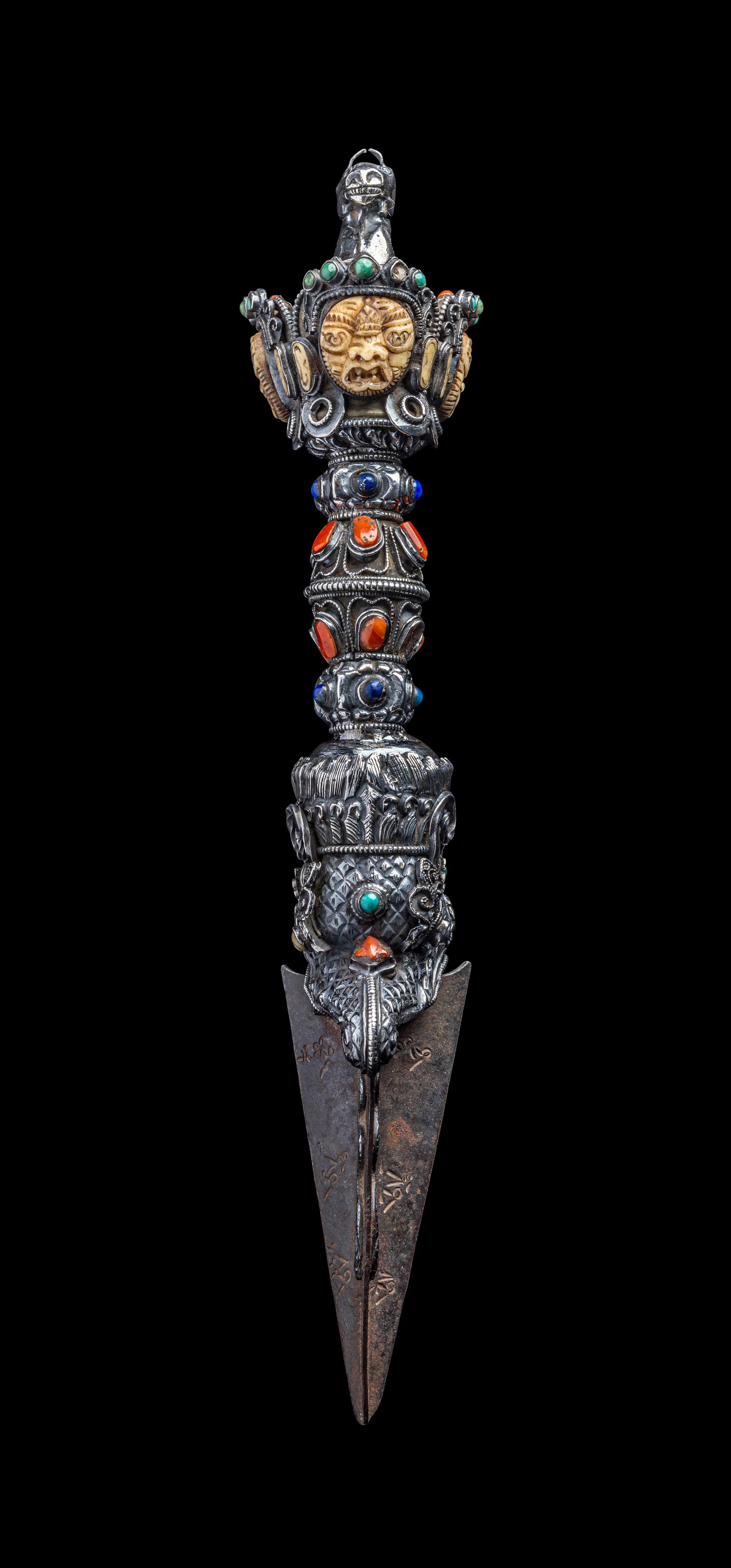A Tibetan Hardstone Inset Silver Vajra