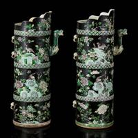 An associated pair of Chinese famille noir-decorated porcelain ceremonial ewers 黑地瓷胎画珐琅多穆壶两只 或为一对 Qing dynasty ?