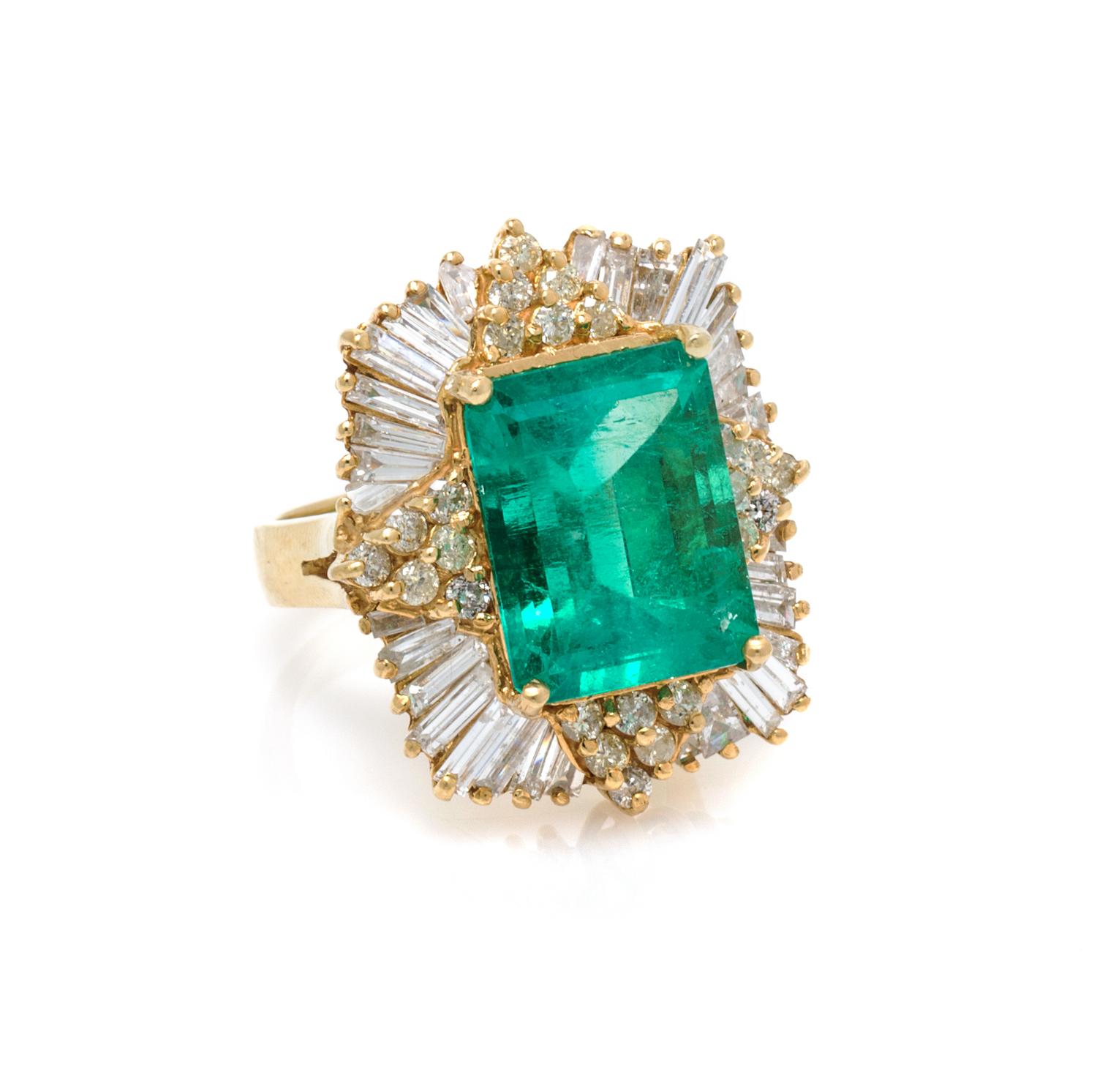 An 18 Karat Yellow Gold, Emerald and Diamond Ring, 9.30 dwts.