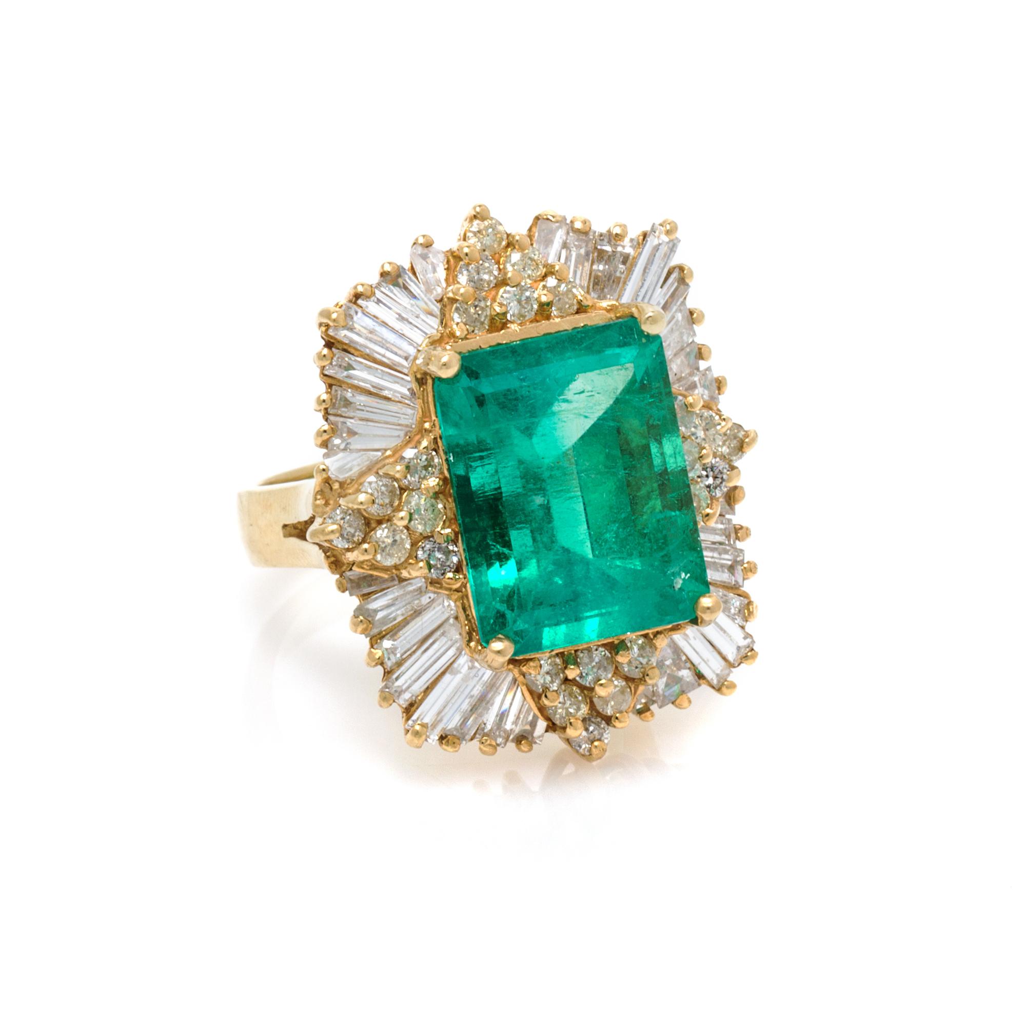 An 18 Karat Yellow Gold, Emerald and Diamond Ring, 9.30 dwts.