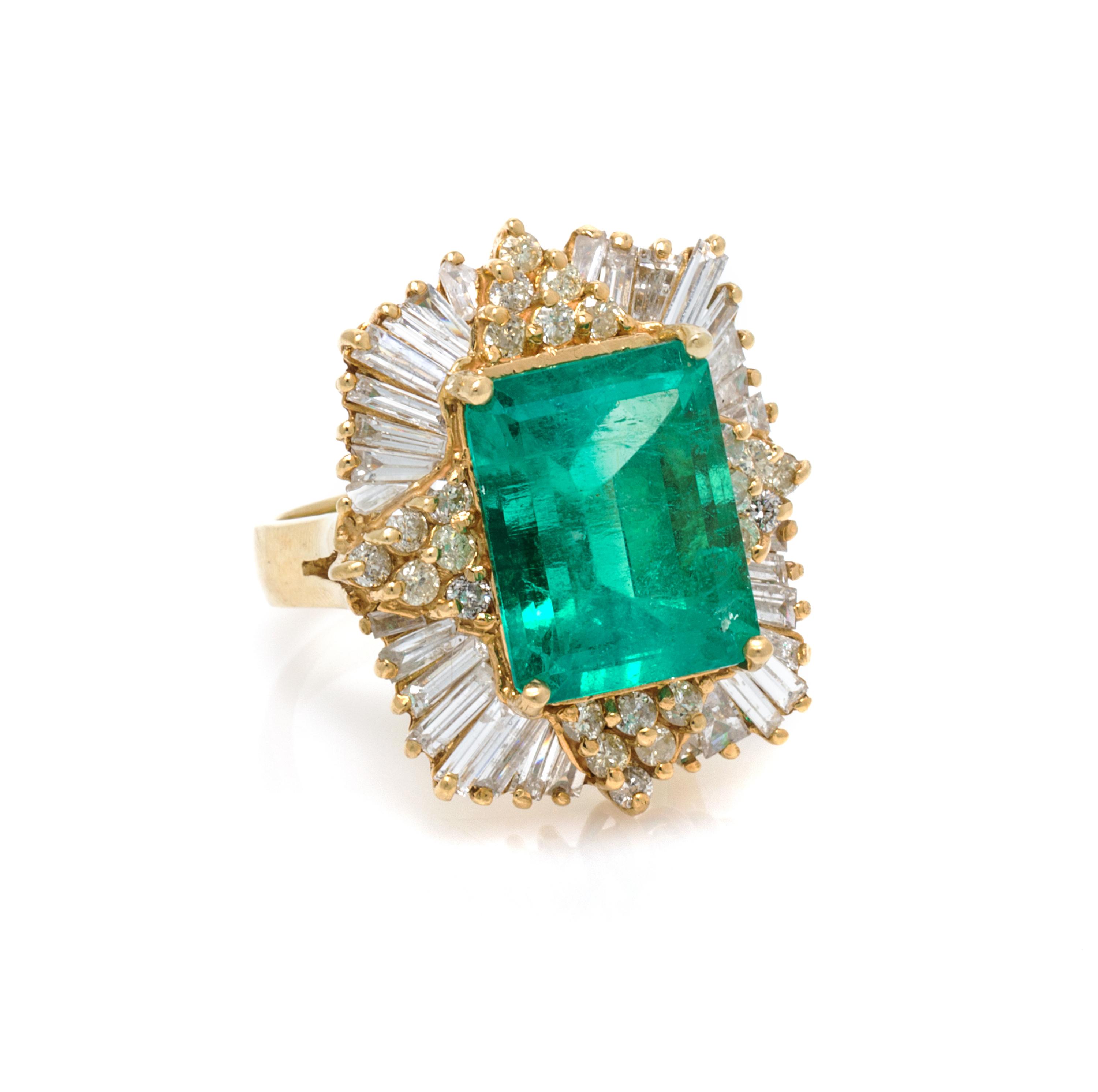 An 18 Karat Yellow Gold, Emerald and Diamond Ring, 9.30 dwts.