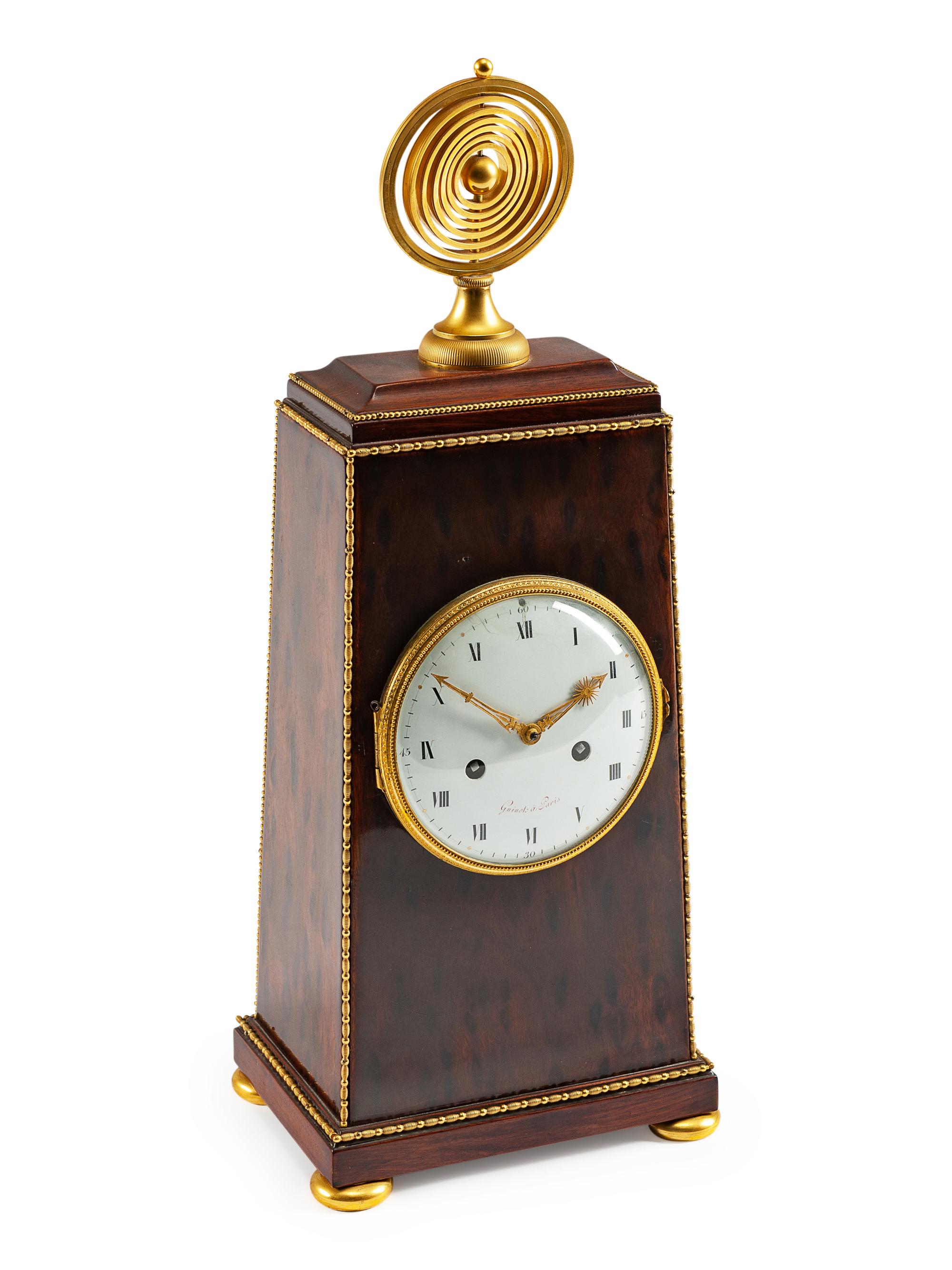 An Empire Gilt Bronze Mounted Mahogany Mantel Clock