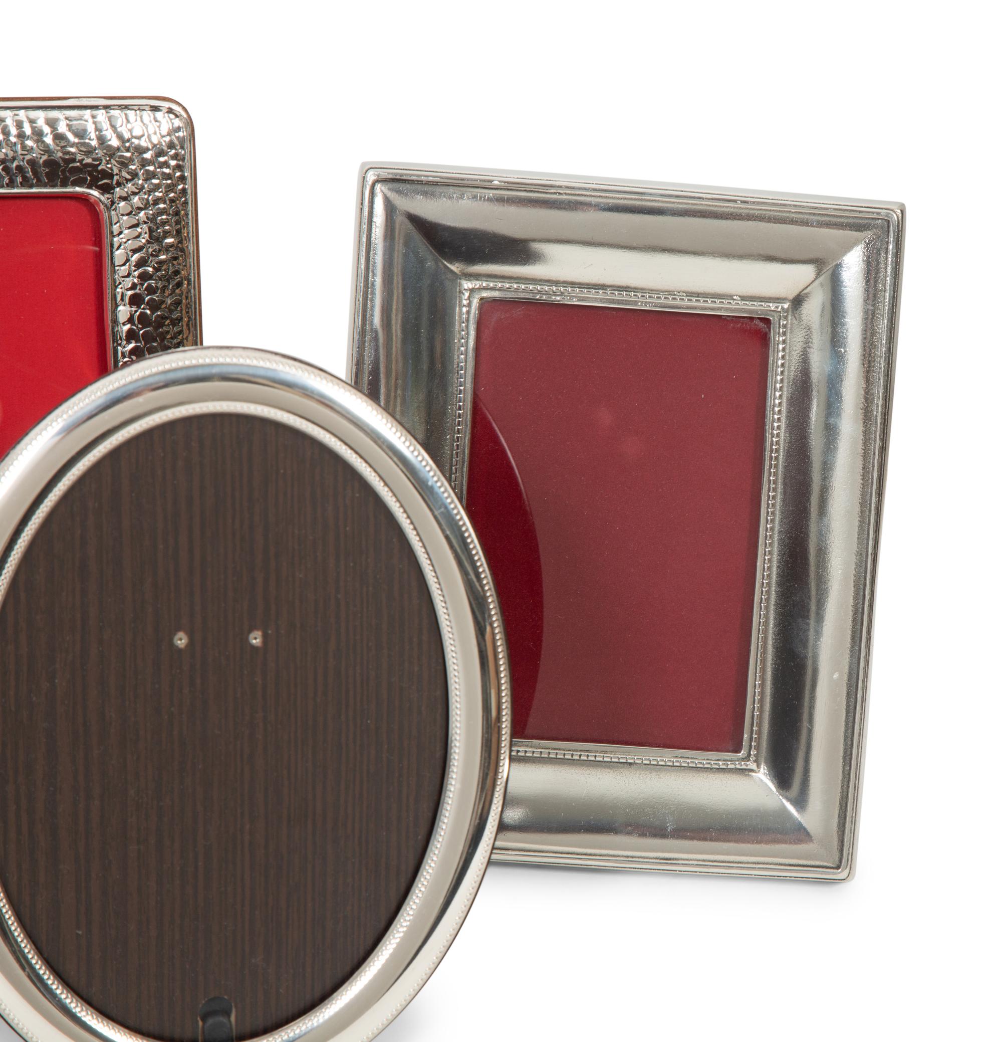 Eight Silvered Metal Picture Frames