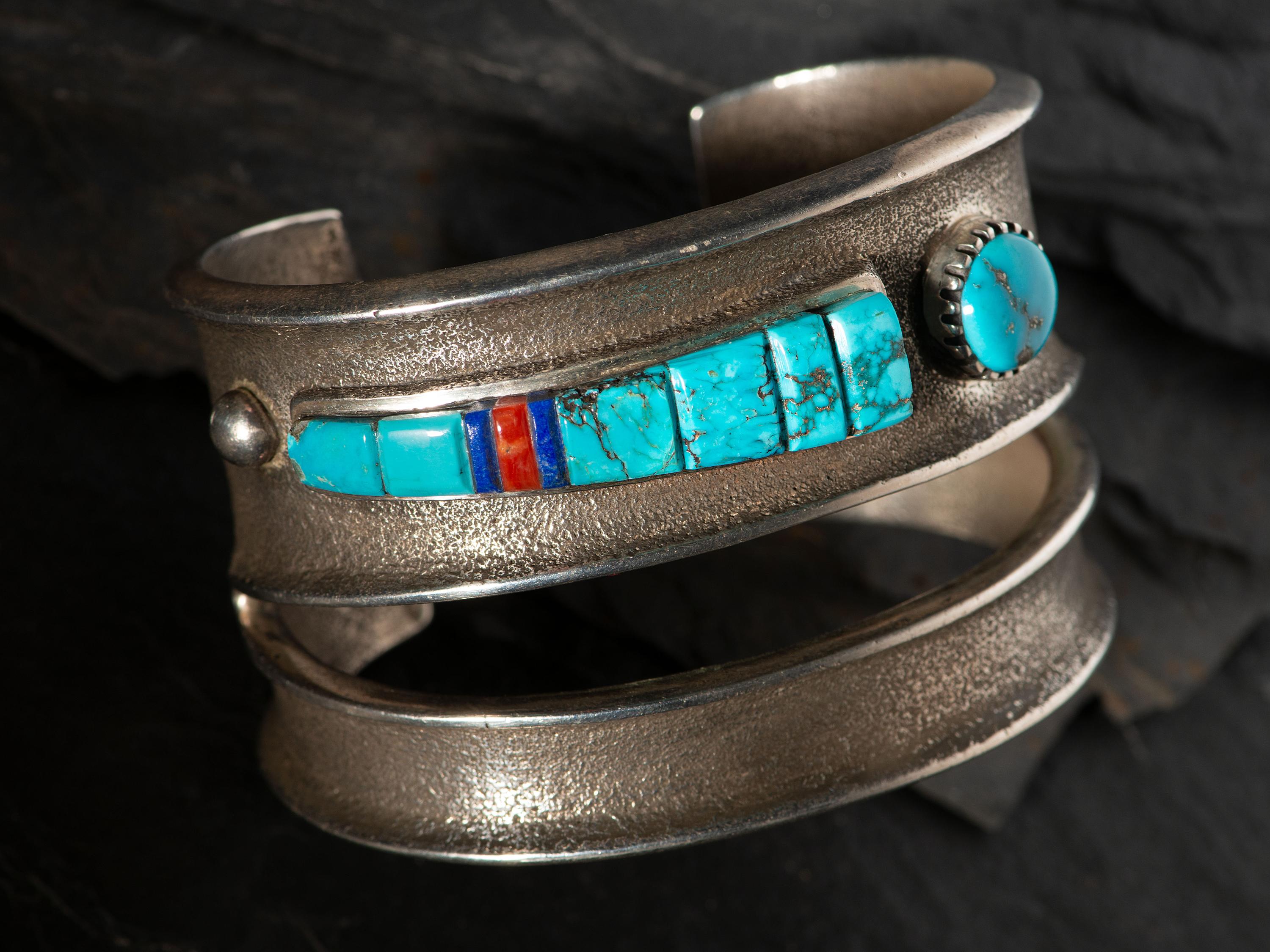 Tufa Cast Silver Cuff Bracelet, with Inlaid Abstract Figural Design