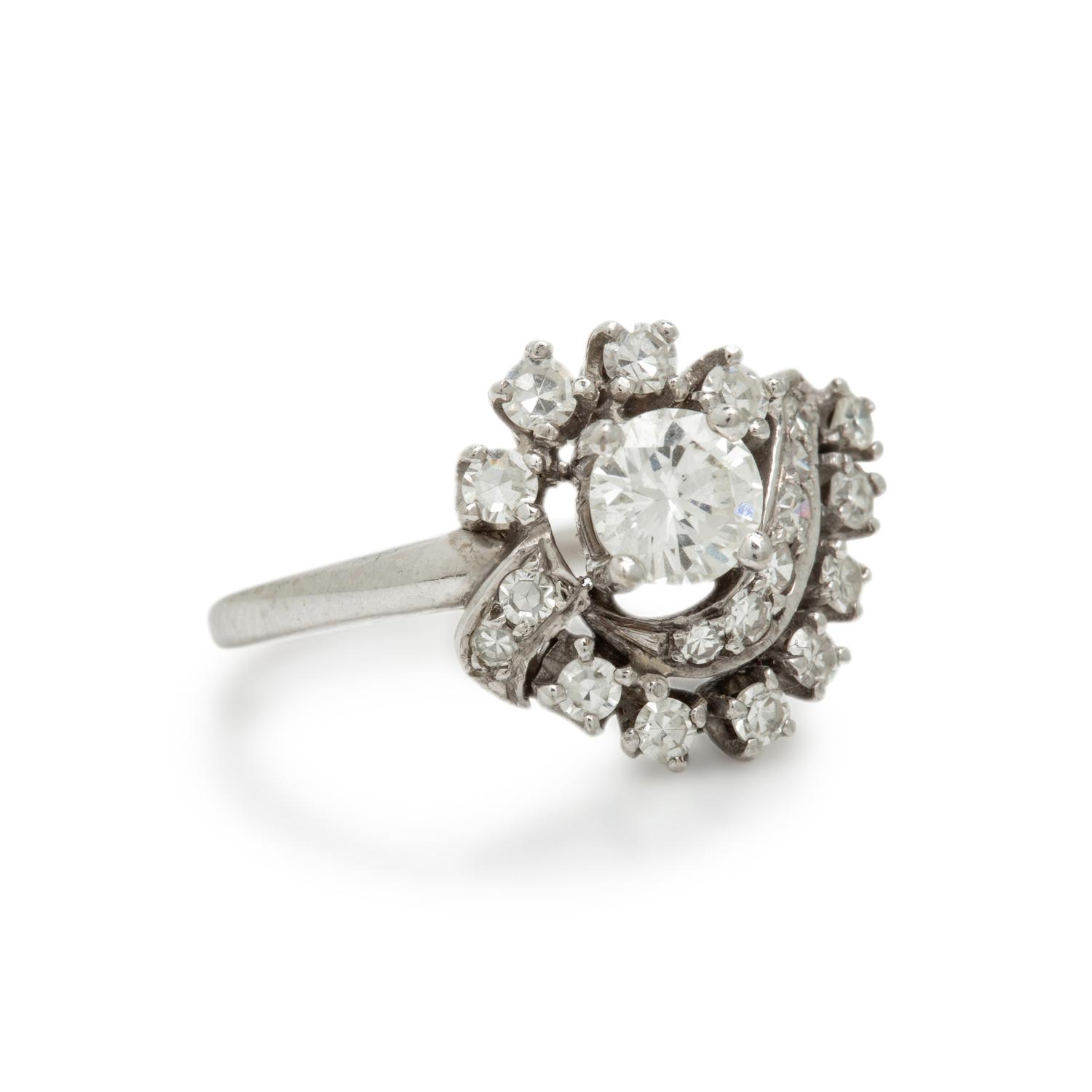 Diamond and White Gold Swirl Ring