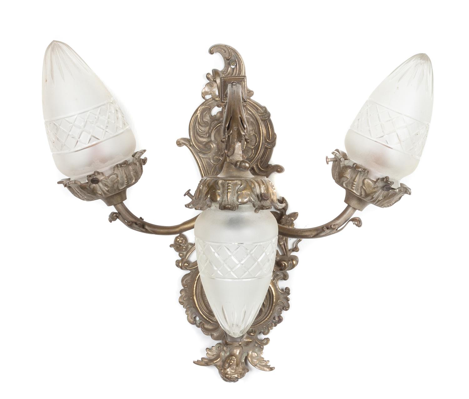 A Louis XV Style Gilt Metal Three-Light Sconce Height 14 inches.