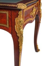 A Louis XV Style Gilt Bronze Mounted Mahogany Veneered Bureau Plat