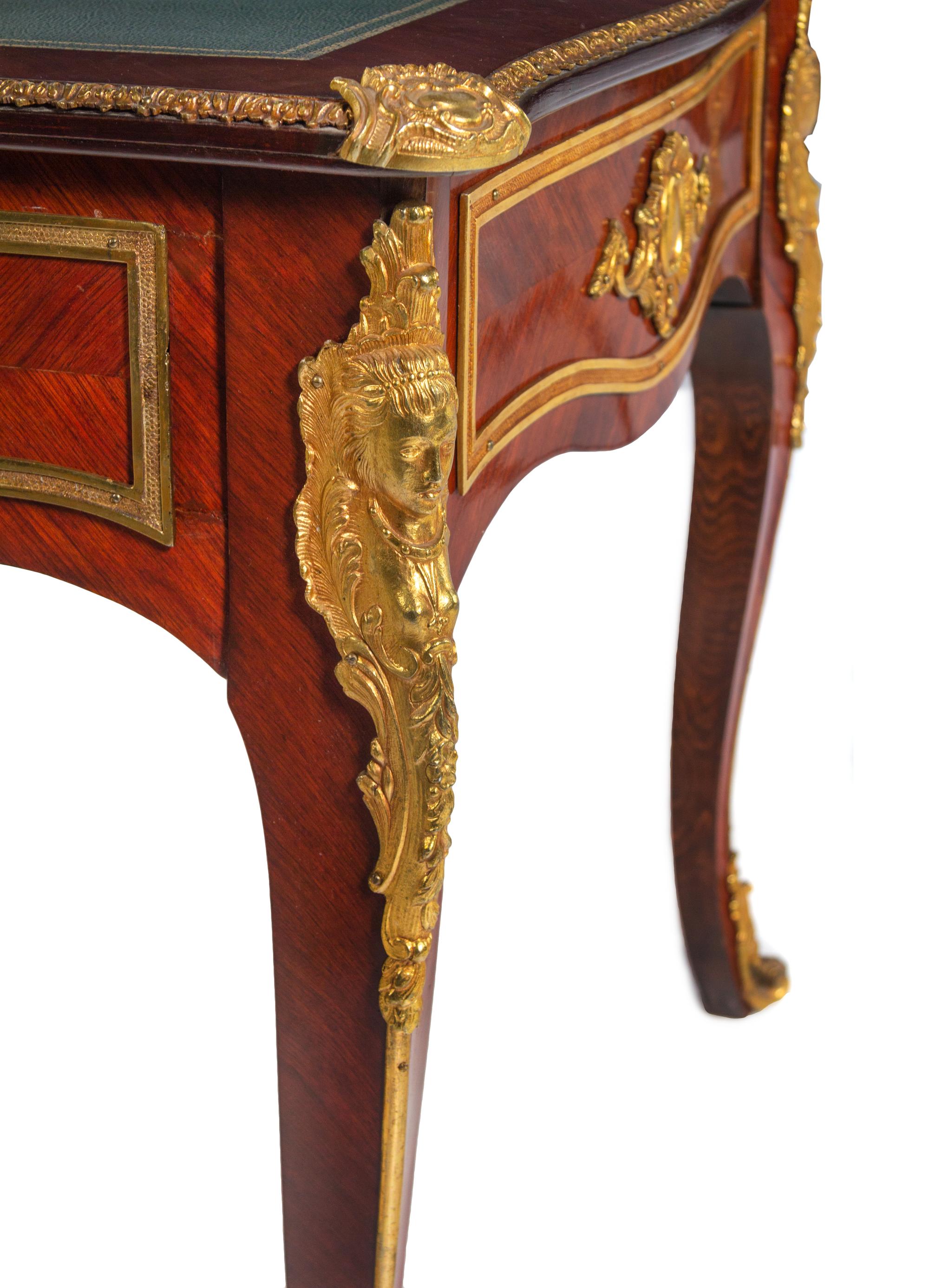 A Louis XV Style Gilt Bronze Mounted Mahogany Veneered Bureau Plat