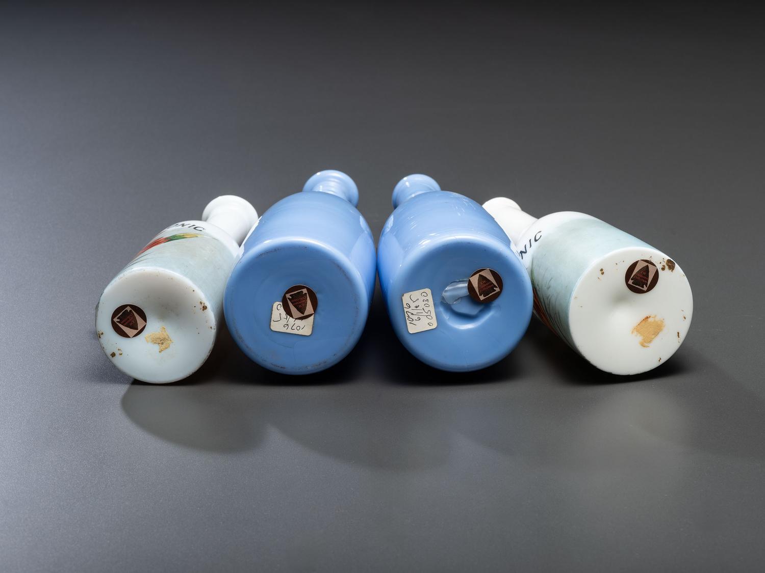 Four Glass Barber Bottles