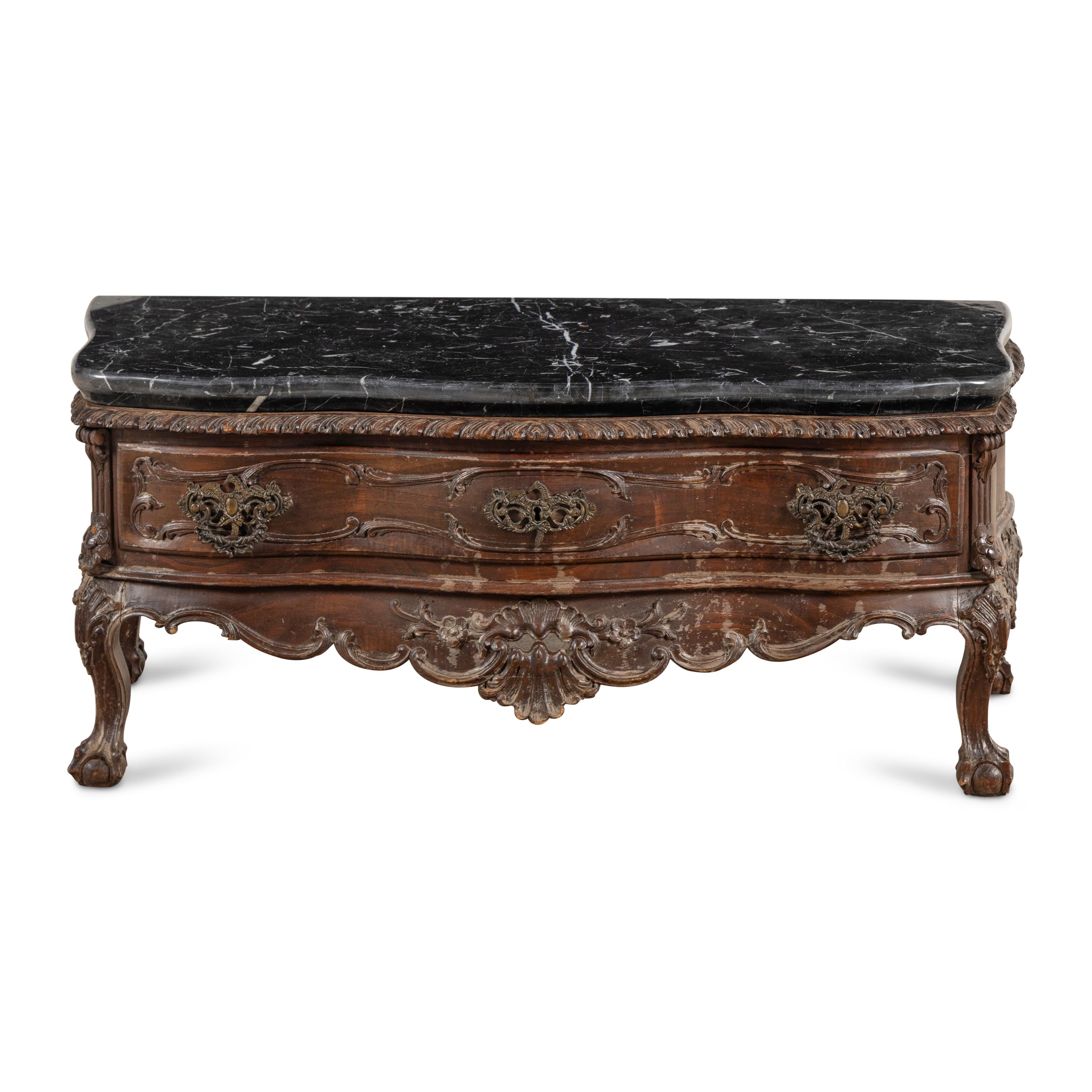 An Italian Carved Walnut and Marble Top Low Console