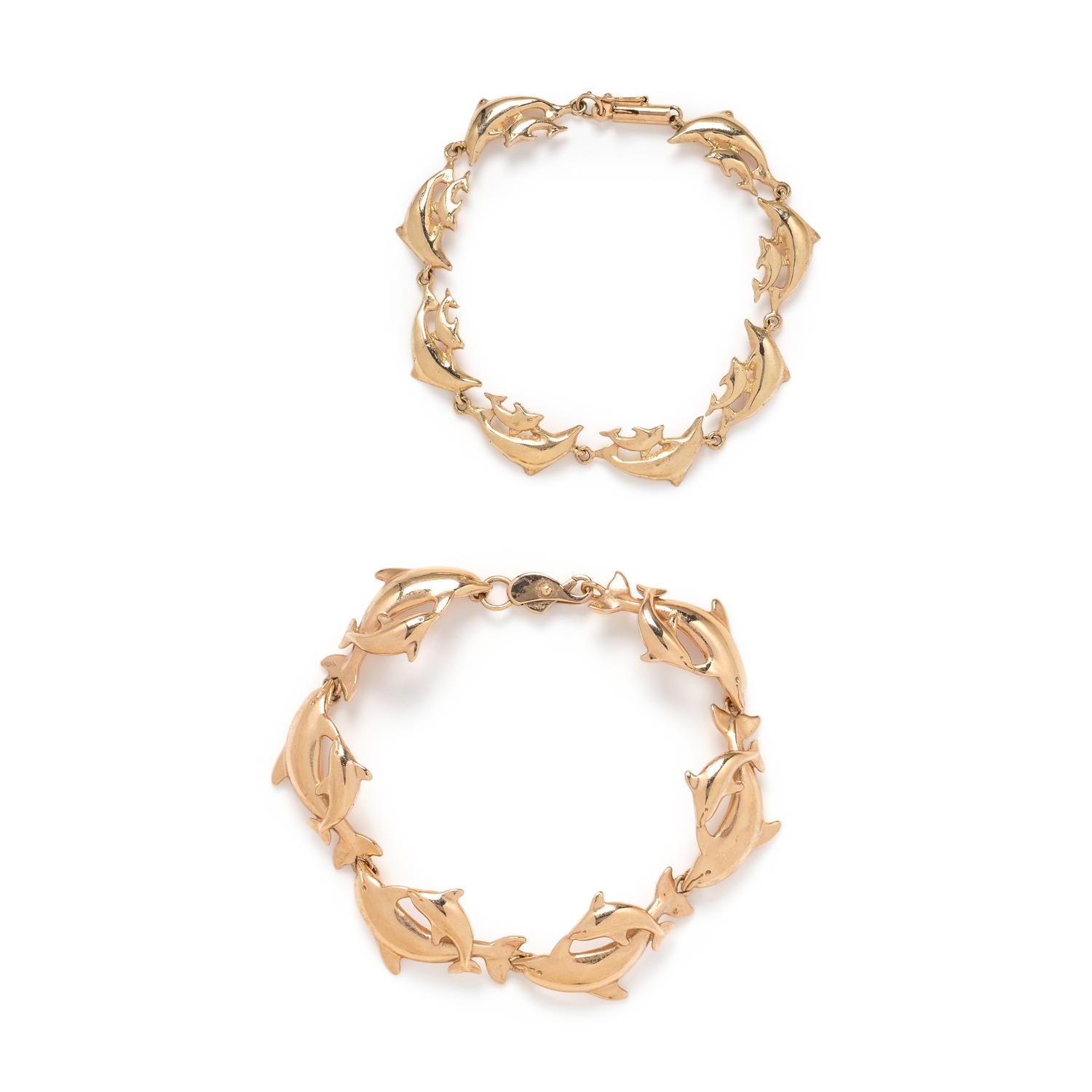 COLLECTION OF YELLOW GOLD DOLPHIN JEWELRY