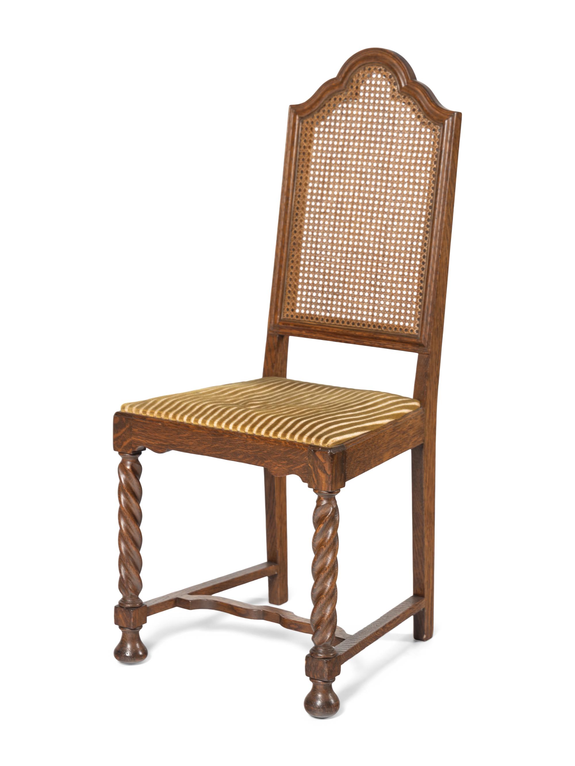 A Set of Eight William and Mary Style Oak Dining Chairs