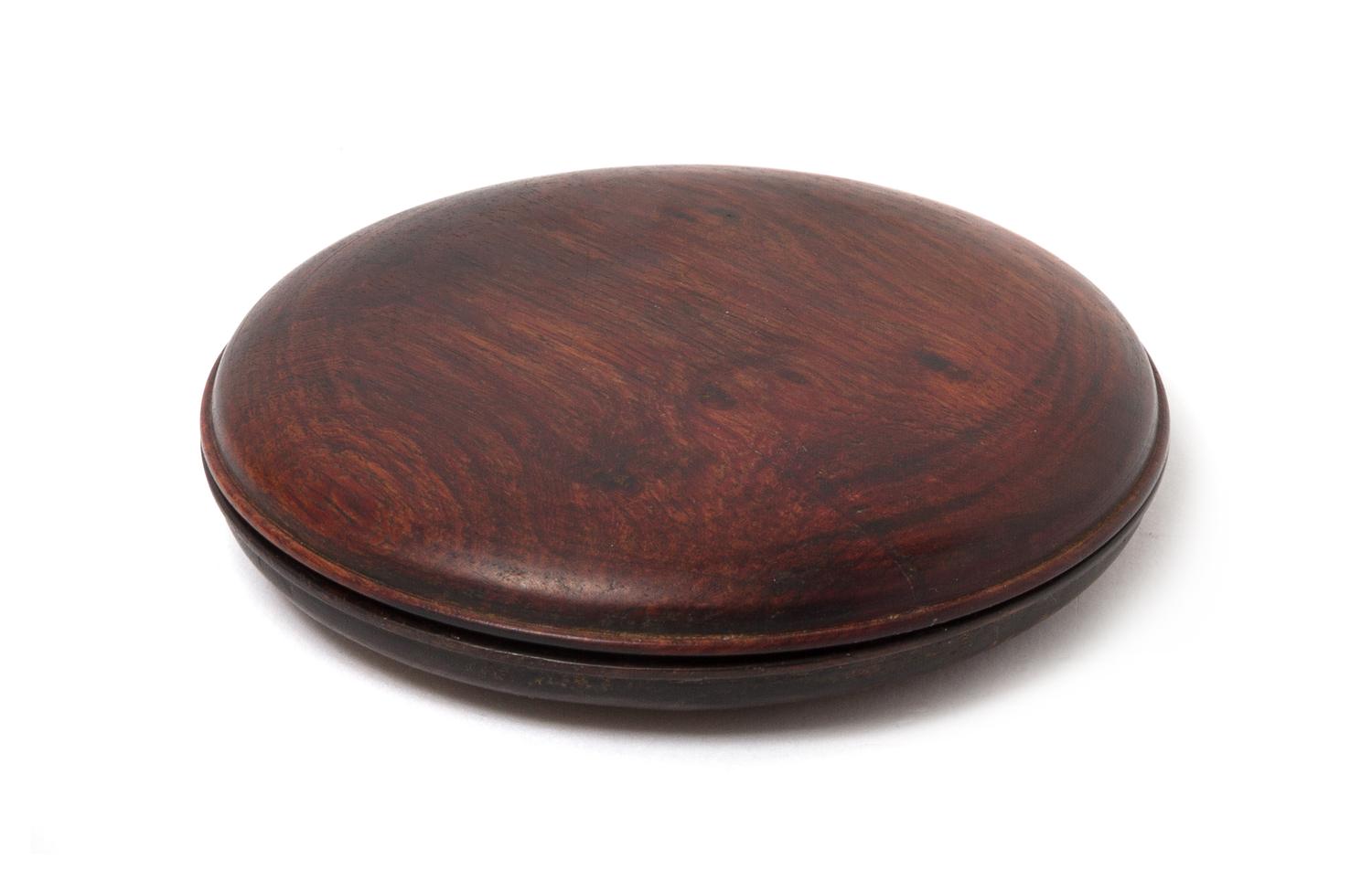A Hardwood Circular Box and Cover Diameter 4 3/4 inches.