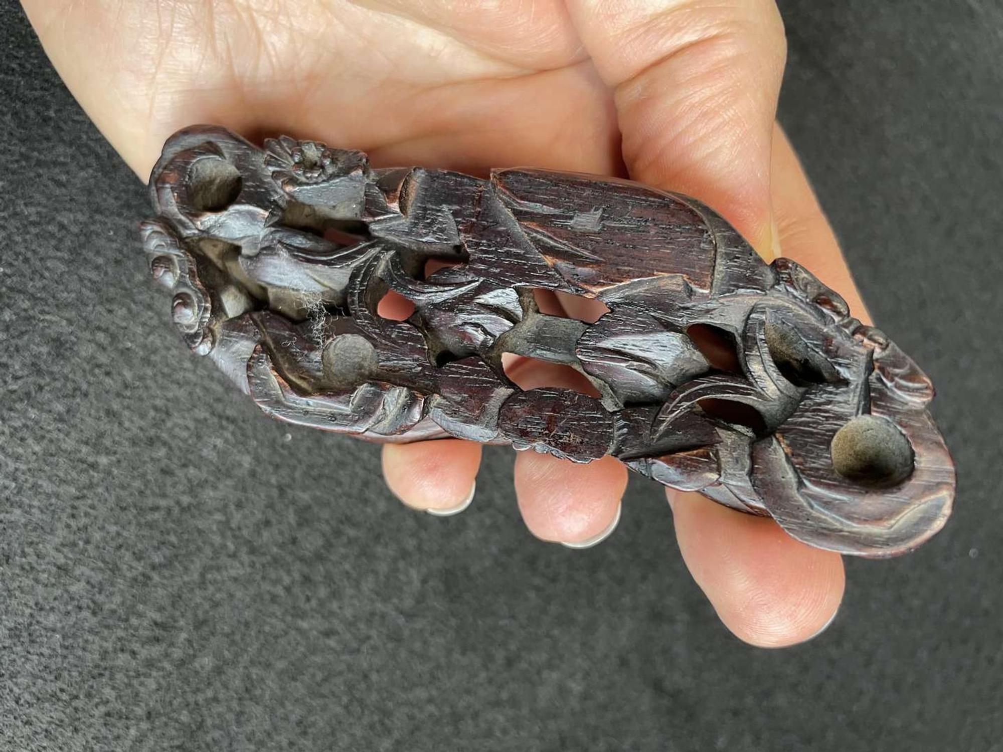 A Chinese jade "Boys, Kylin and Phoenix" vase on carved wood stand 玉雕童子凤鸟花樽及底座