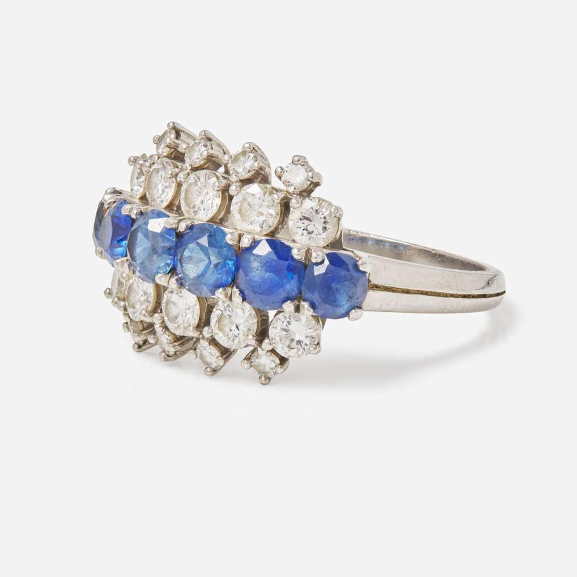 A J.E. Caldwell Platinum, Sapphire, and Diamond Ring