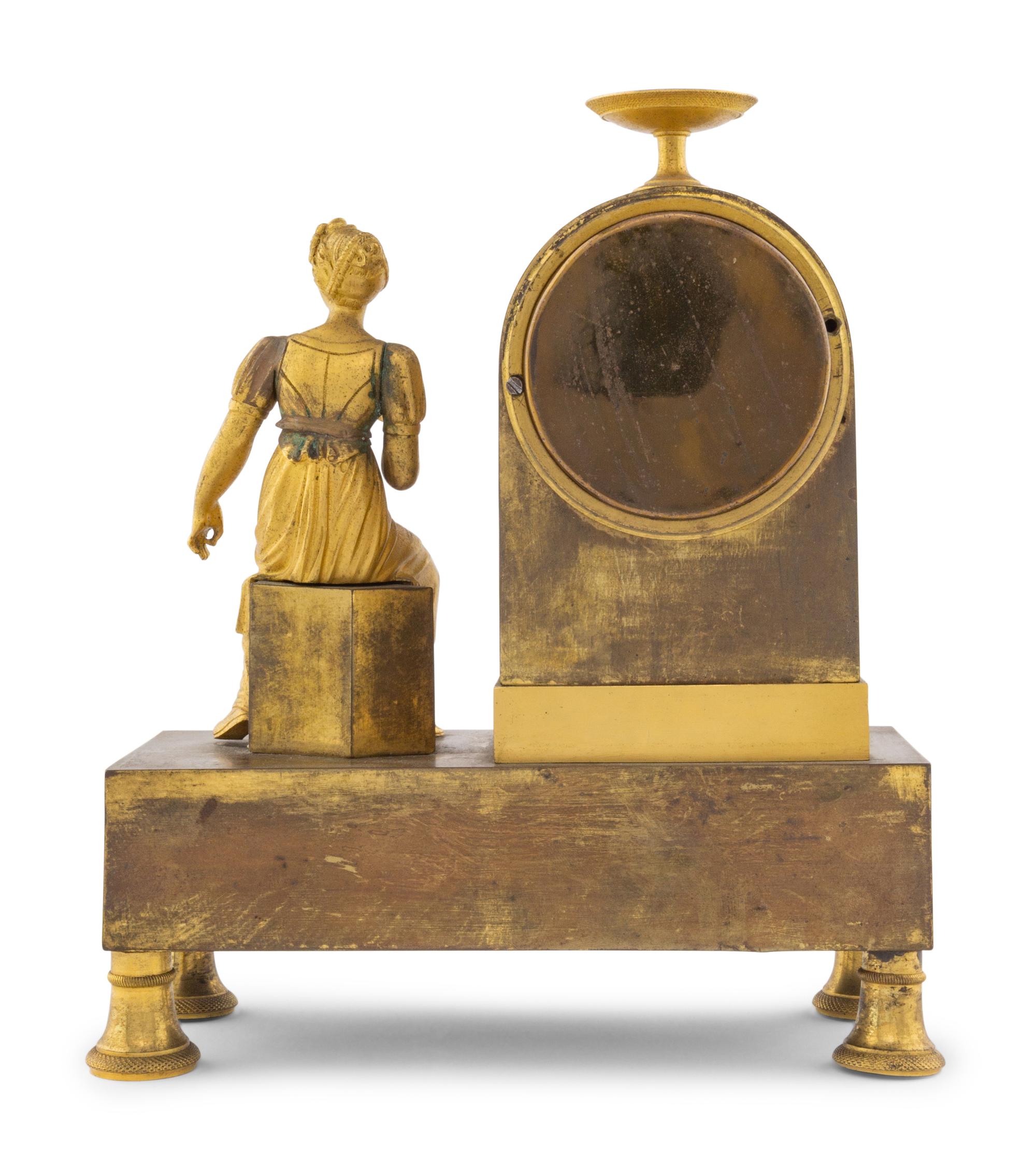 An Empire Gilt Bronze Clock