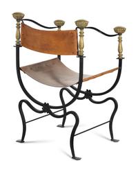 A Near Pair of Continental Iron and Brass Curule Armchairs