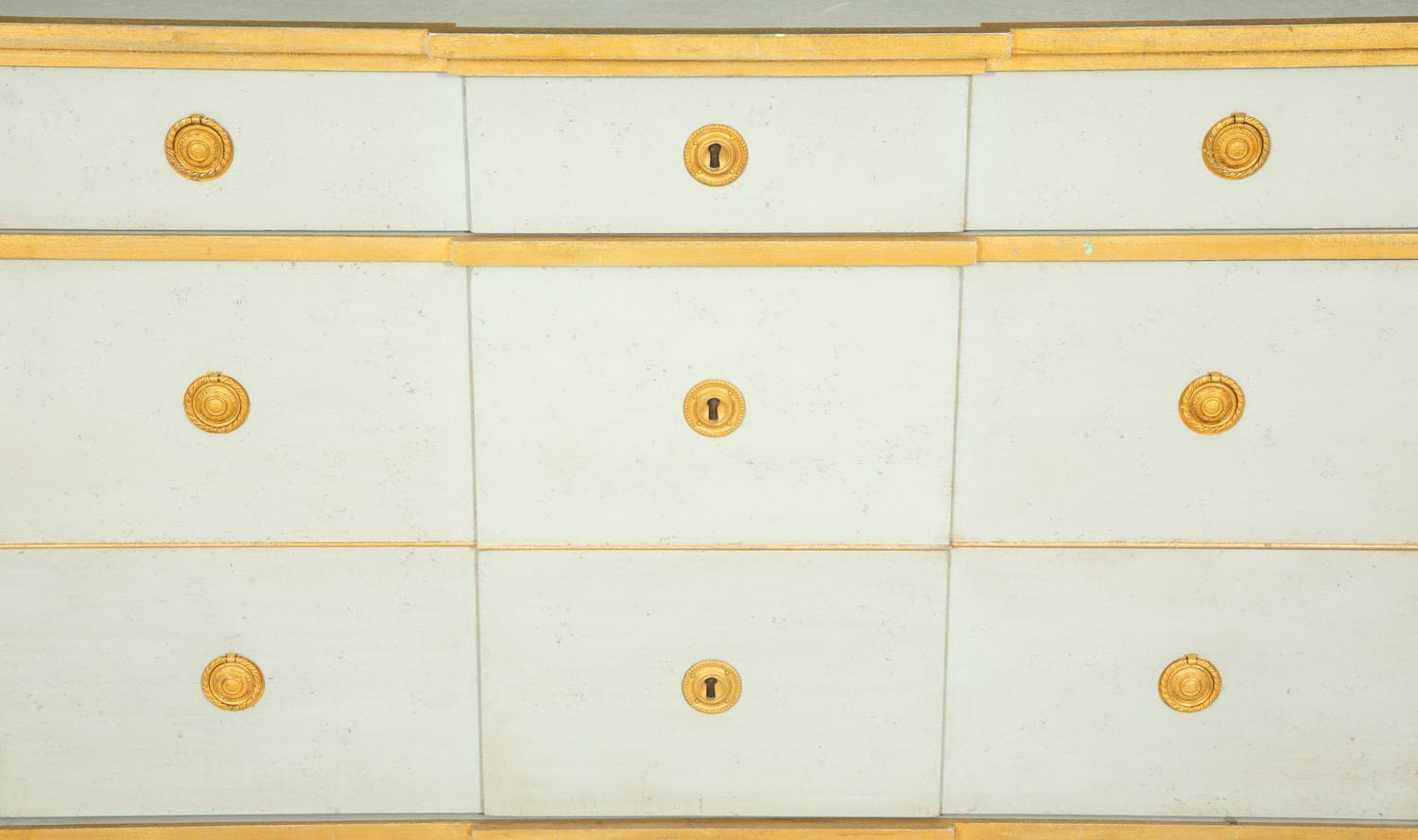 A Green Painted and Parcel Gilt Chest of Drawers