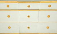 A Green Painted and Parcel Gilt Chest of Drawers