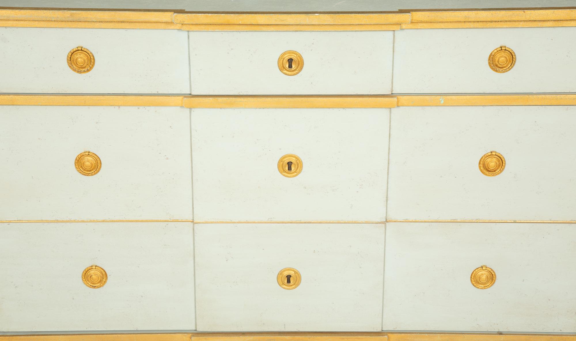 A Green Painted and Parcel Gilt Chest of Drawers