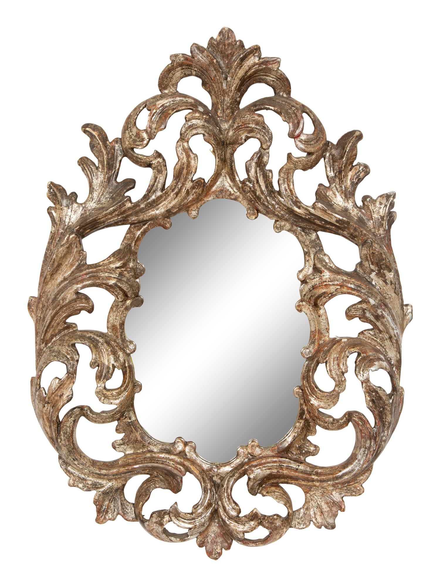 An Italian Baroque Style Silvered Wood Mirror